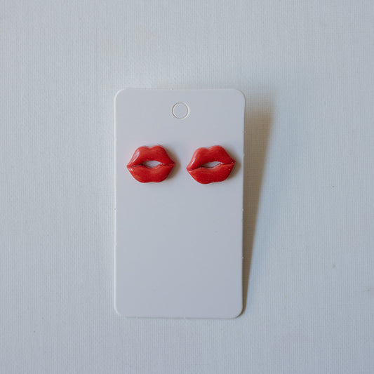 Kiss + Tell